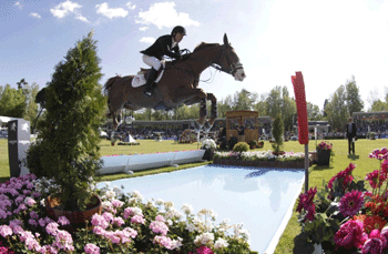 Michael Whitaker claims the Grand Prix in Madrid: Luciana Diniz sixth