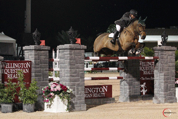 Ronan McGuigan races to victory in the Wellington Equestrian Realty Grand Prix