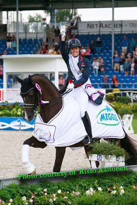 Dujardin does a Special double on dramatic day in Aachen
